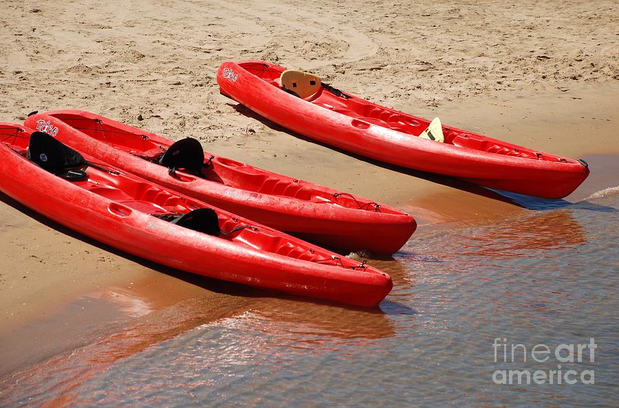 Ocean Kayak at Shore Photograph by Claudia Ellis