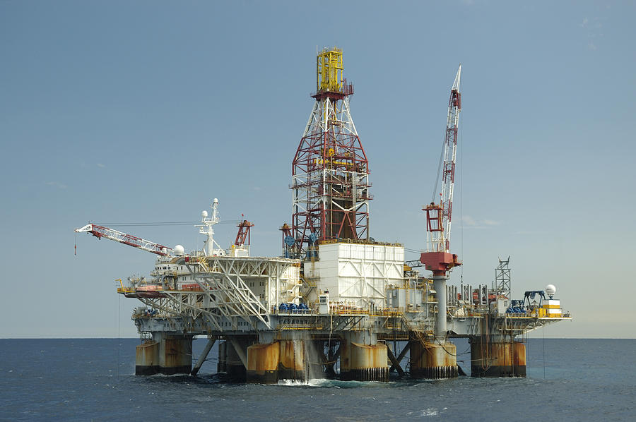 Ocean oil rig Photograph by Bradford Martin