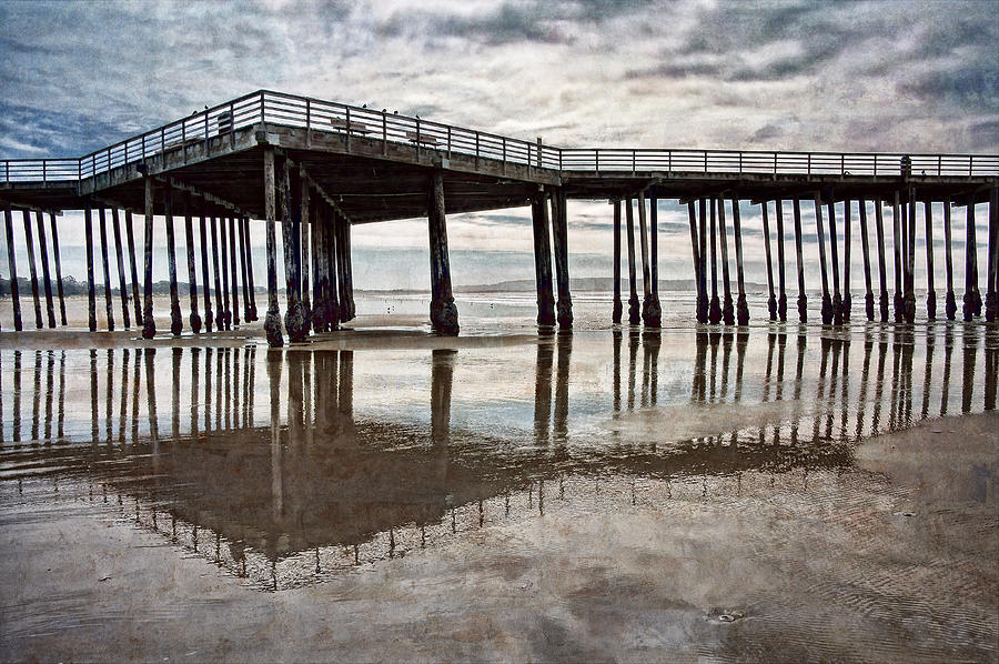 Ocean Pier and Wet Sands Photograph by Leda Robertson