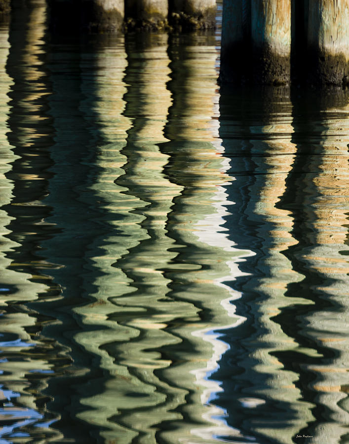 Ocracoke reflections Photograph by John Pagliuca