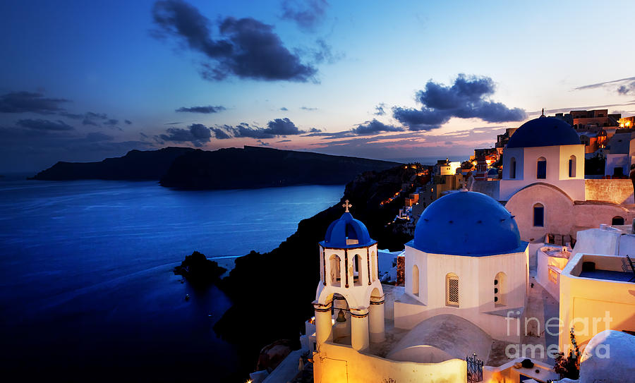 Oia town on Santorini island Greece at night Photograph by Michal Bednarek