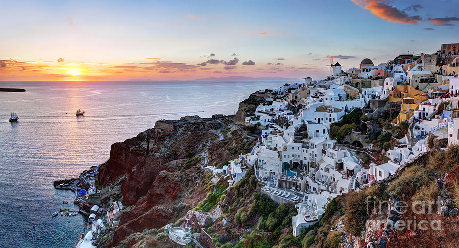 Oia town on Santorini island Greece at sunset Photograph by Michal Bednarek