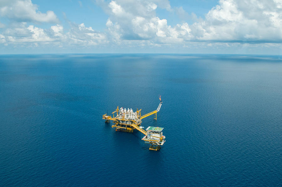 Oil and gas drilling platform Photograph by Kampee Patisena