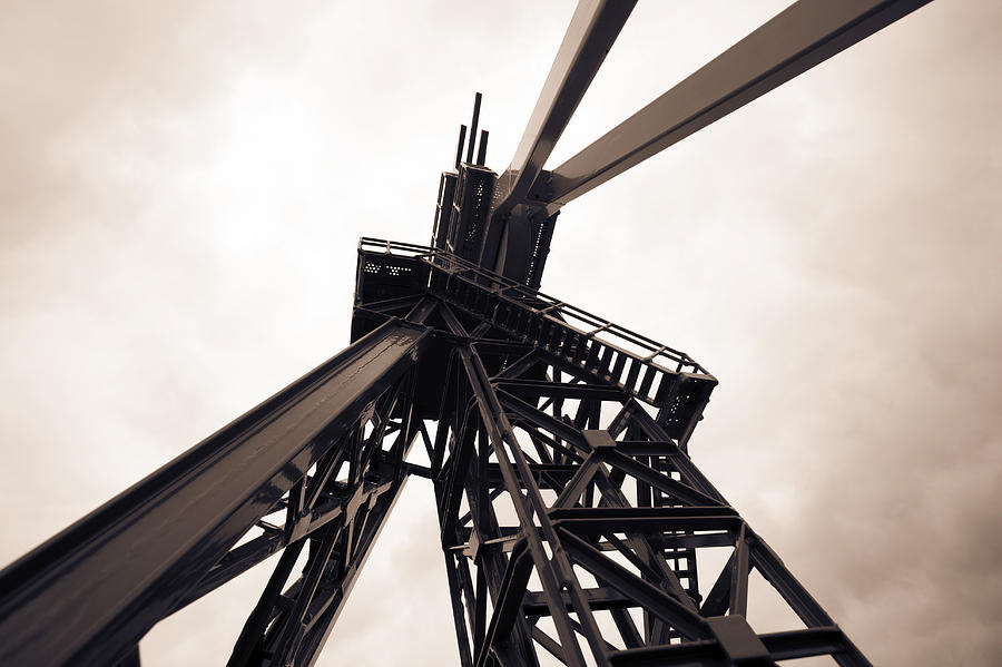 Oil drill, low angle view Photograph by Wladimir Bulgar