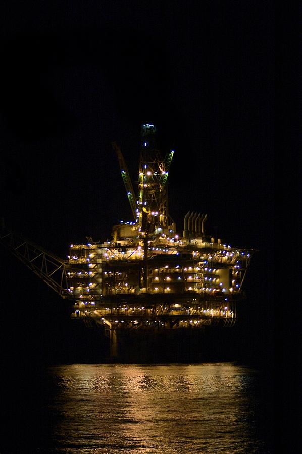 Oil Rig Photograph - Oil production platform at night by Bradford Martin