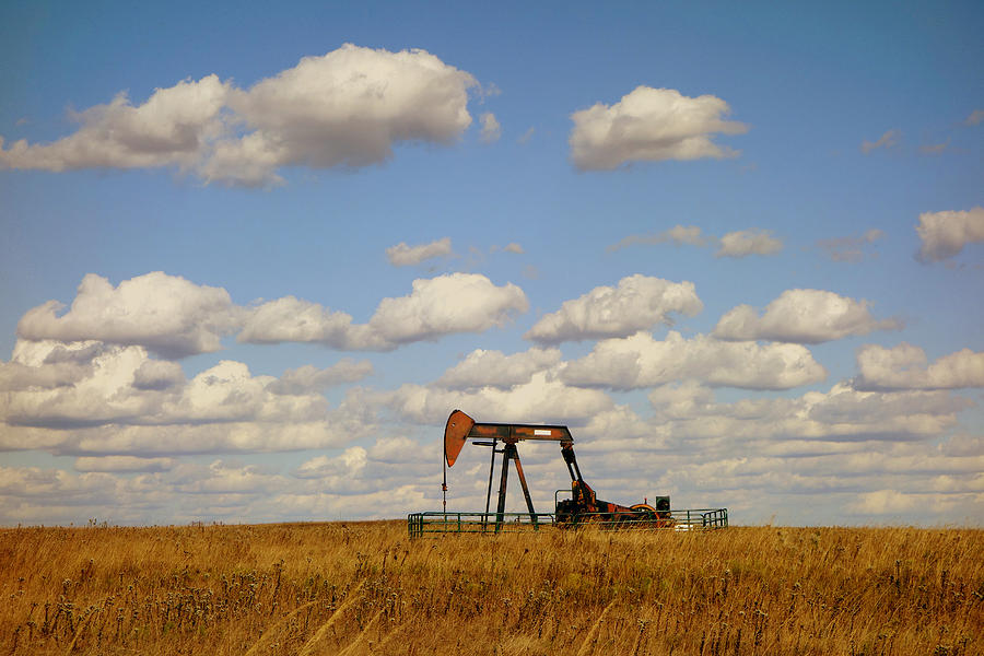 Oil Pump Jack on the Prairie Photograph by Ann Powell