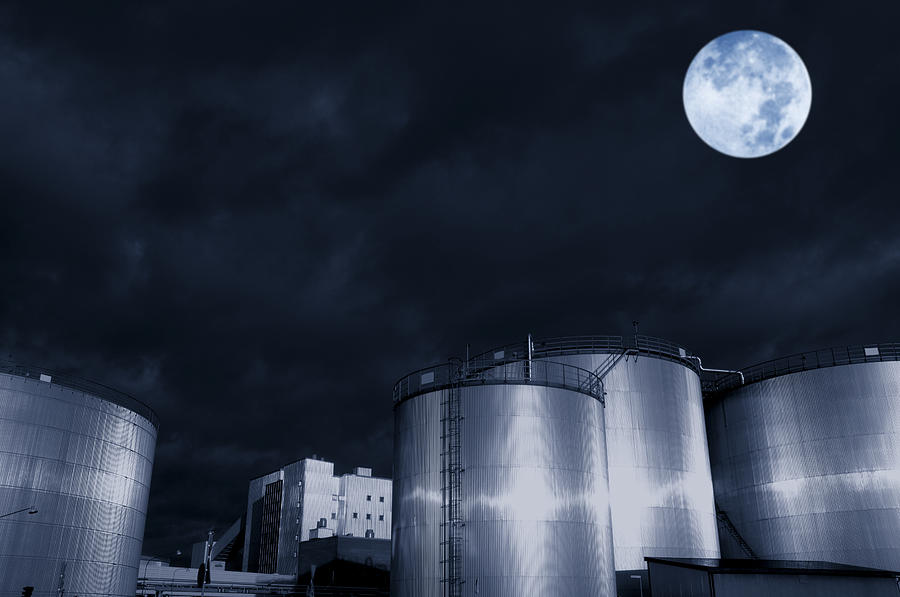 Oil Refinery And Moonlight Photograph by Christian Lagereek