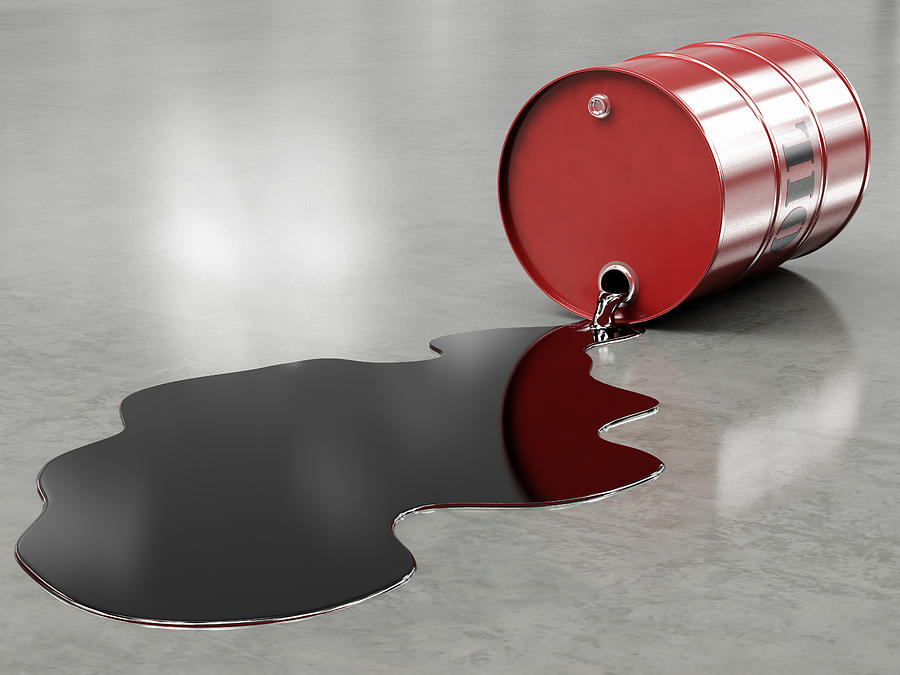 Oil spilling from red barrel onto floor Photograph by Mevans