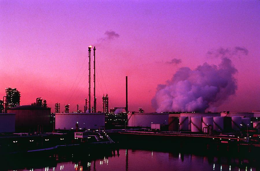 Oil Storage Tanks And Refinery Photograph by David Parker/science Photo Library