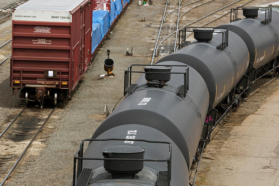 Oil Tankers At A Rail Yard Photograph by Jim West