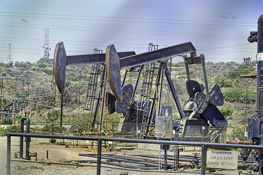 Oil Wells Pumping Photograph by Chuck Staley