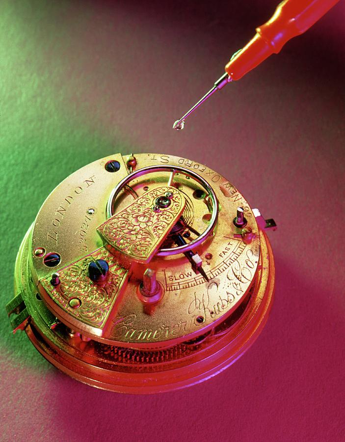 Oiling The Balance Arm Of A Pocket Watch Photograph by Sheila Terry/science Photo Library