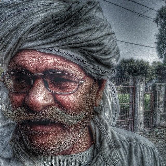 Old Age And Wisdom Goes Hand In Hand Photograph by Mirza Malik