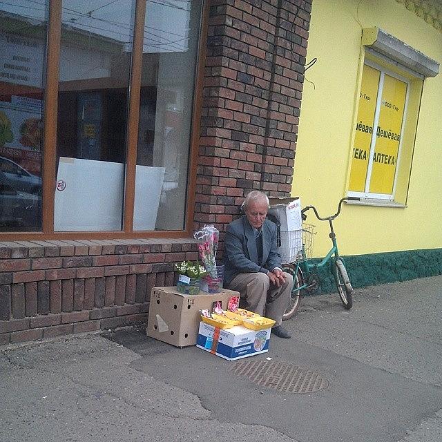 Money Photograph - Old Aged Man Is Sitting On The Street by Konstantin Kanarev
