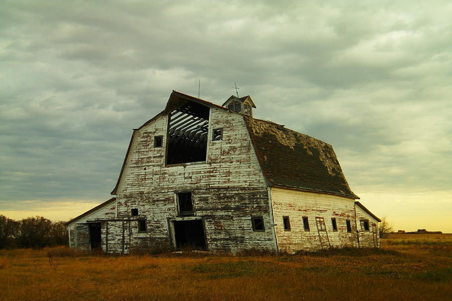 Old barn ready to fall Photograph by Jeff Swan