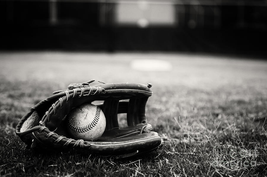 Baseball Photograph - Old Baseball and Glove on Field by Danny Hooks