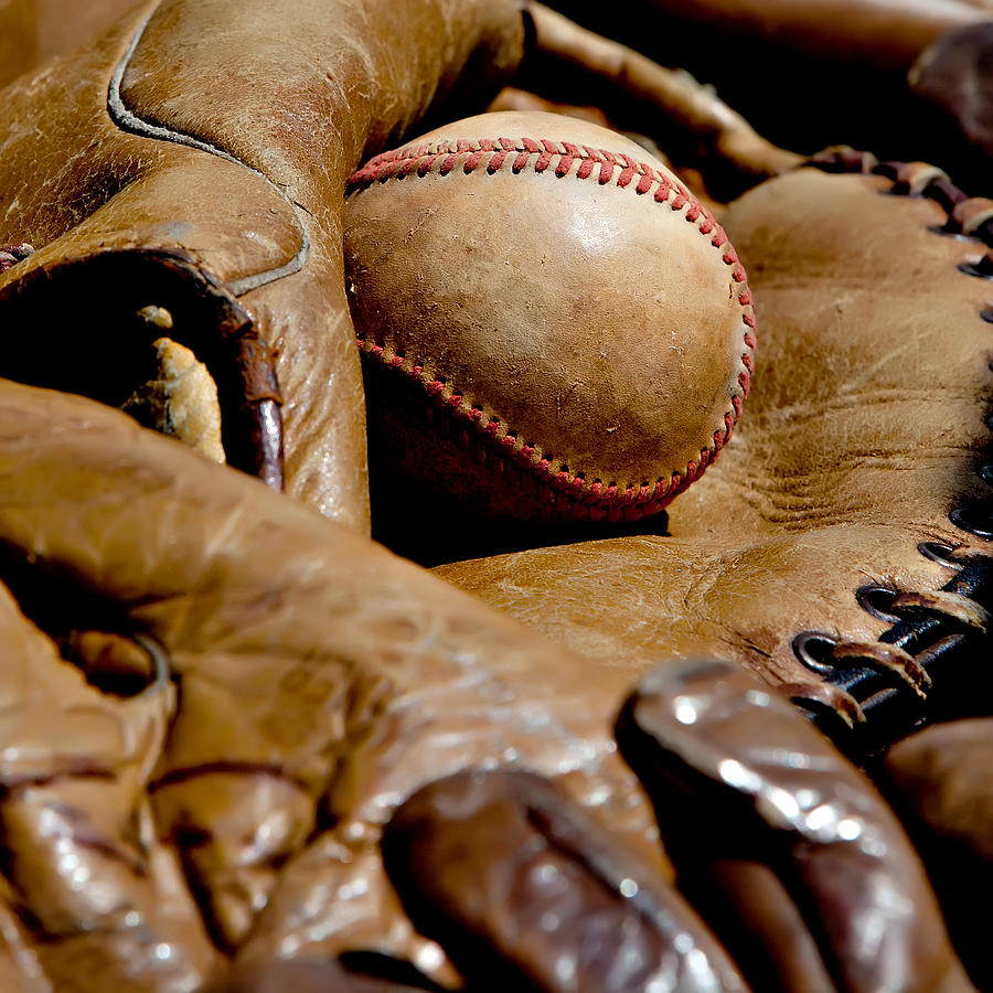 Old Baseball Ball and Gloves Photograph by Art Block Collections