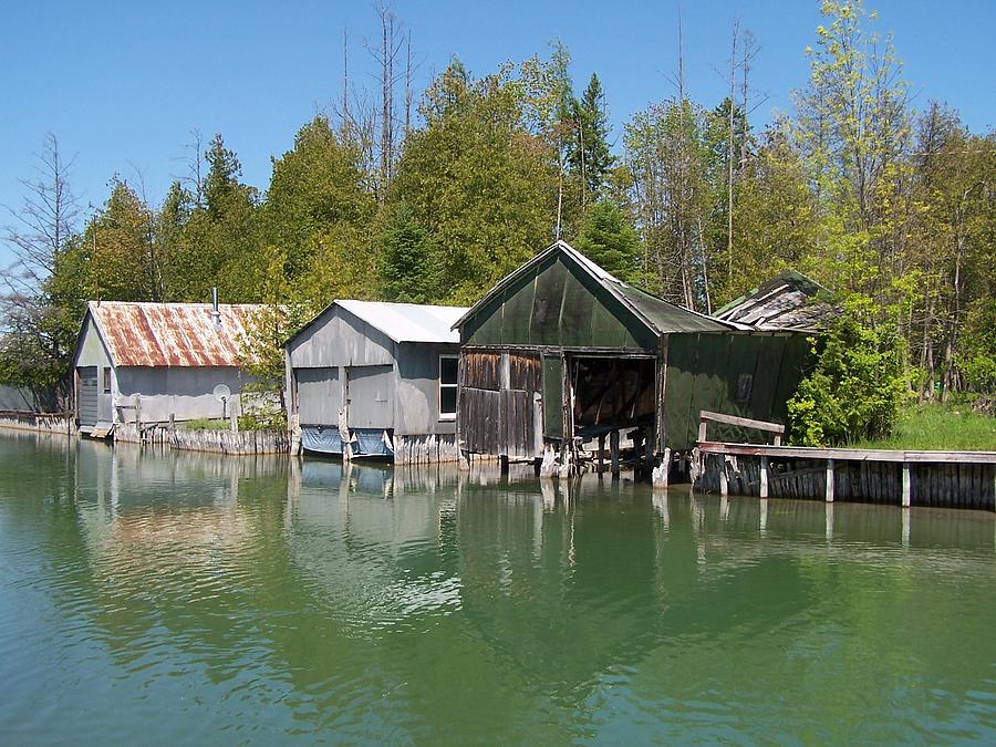 Old Boathouses on the Crooked River Photograph by Kathleen Luther