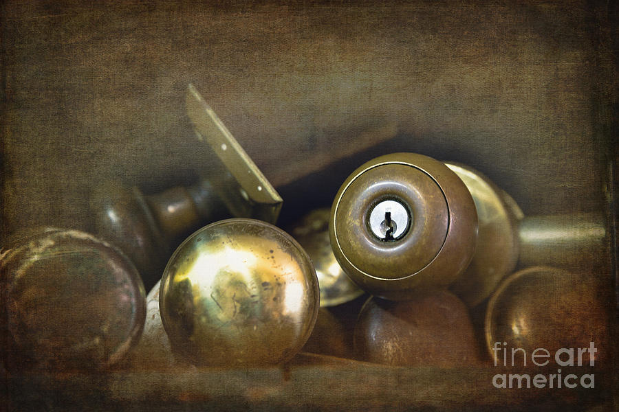 Old brass door knobs Photograph by Jane Rix
