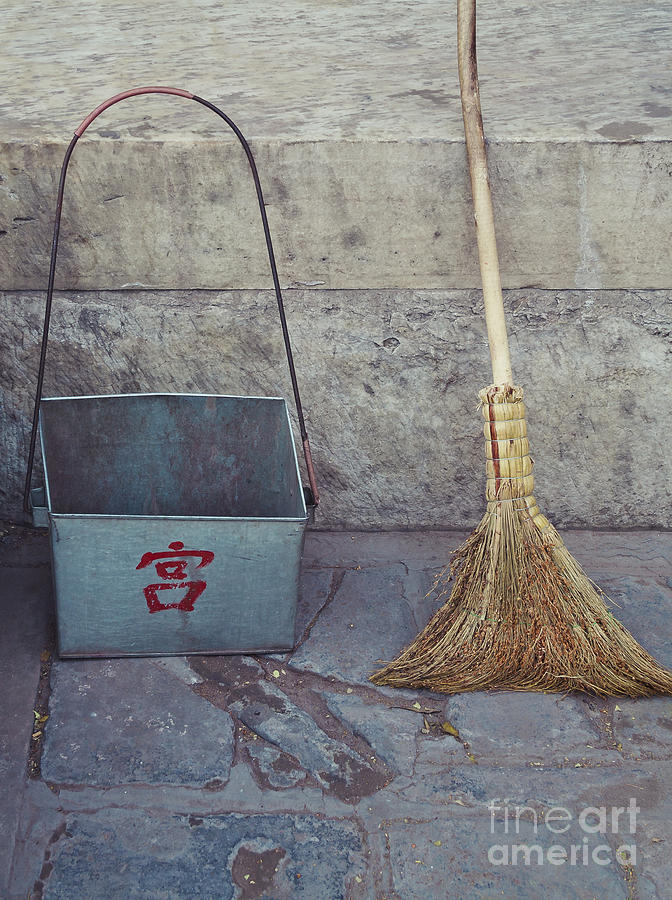 Old broom and dust pan on Beijing street Photograph by Bryan Mullennix