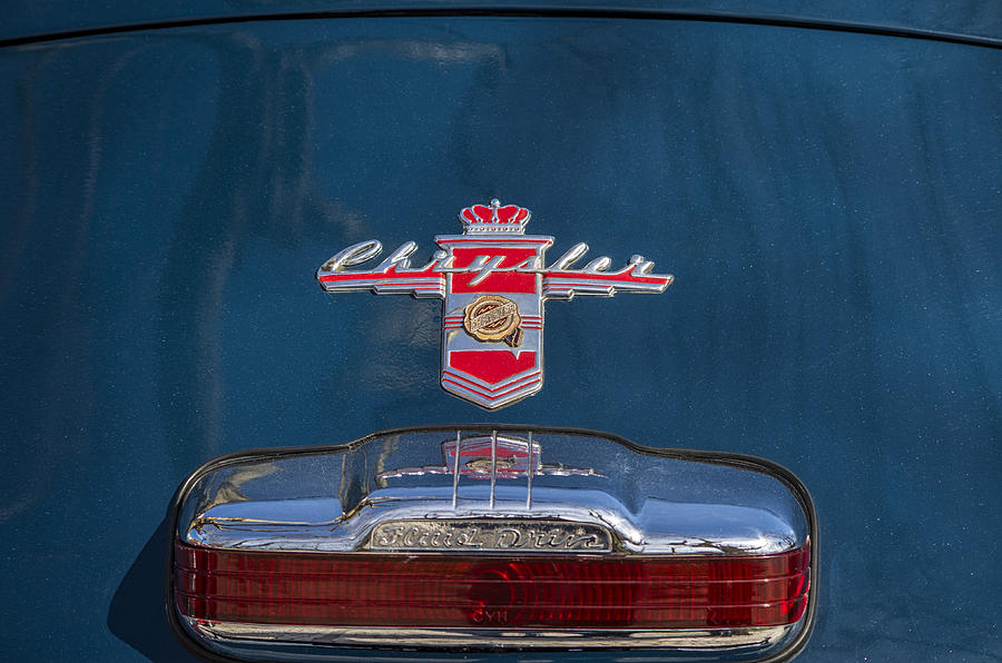 Old Chrysler symbol Photograph by Paulo Goncalves