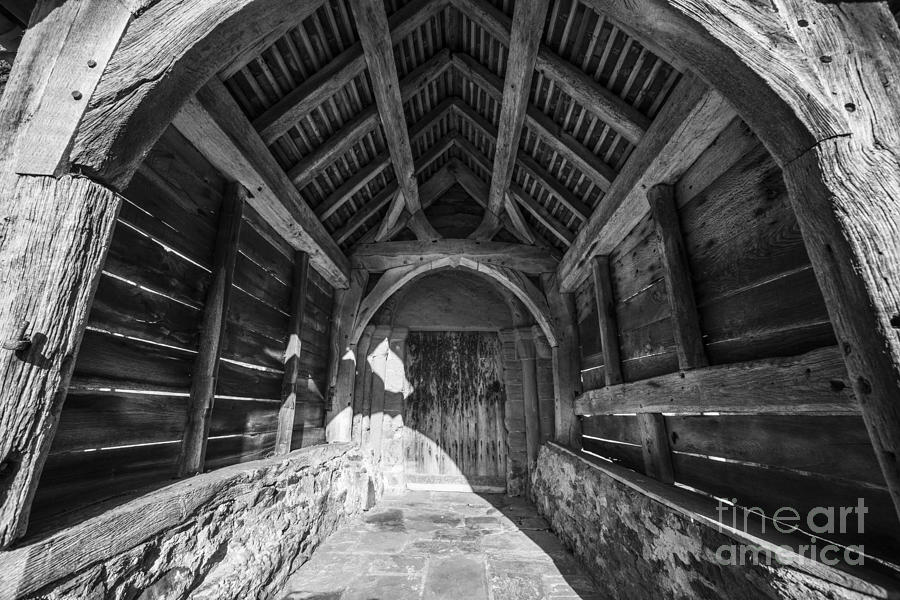 Black And White Photograph - Old church wooden porch by John Hayward
