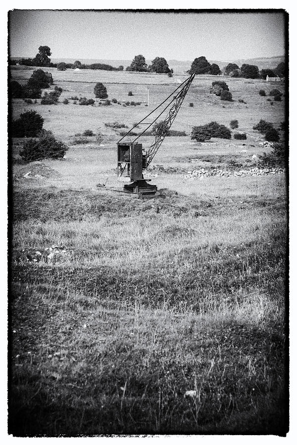 Black And White Photograph - Old Crane on Bonsall Lead mine workings by Bob Kemp