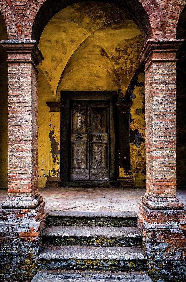 Old Decorated Wooden Door In A Ghost Photograph by Ardenvis