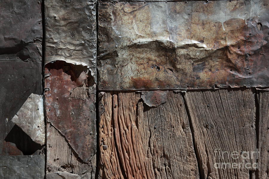 Old door textures Photograph by James Brunker