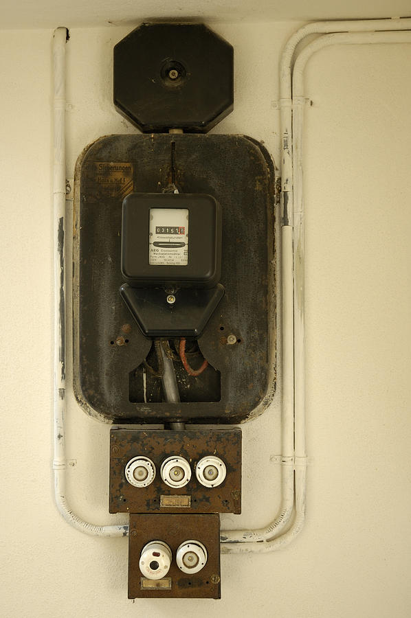 Old electricity meter Photograph by Matthias Hauser