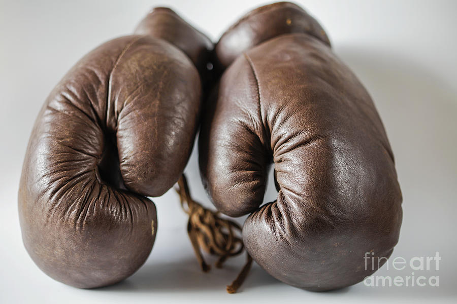 Old fashioned boxing gloves Photograph by Patricia Hofmeester
