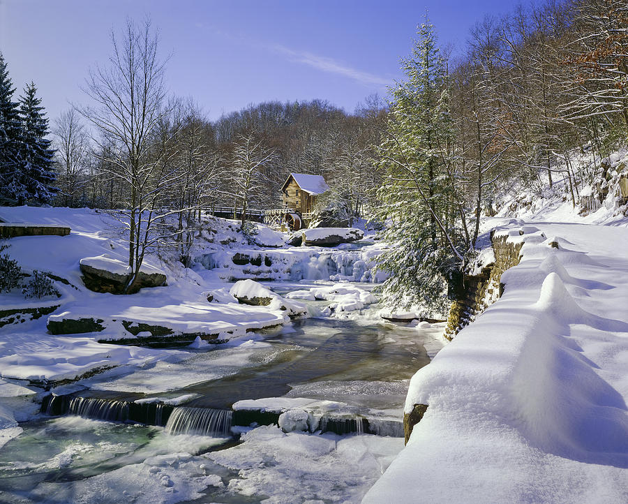 Old-fashioned Watermill Gristmill And Stream In Snow Photograph by Dszc