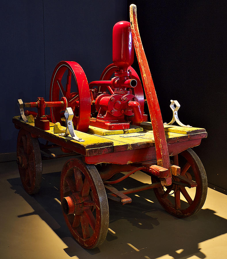 Old fire pump Photograph by Ivan Slosar