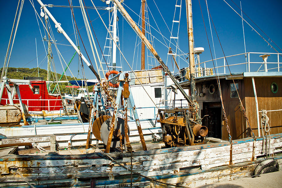 Old fishing boats fleete Photograph by Brch Photography