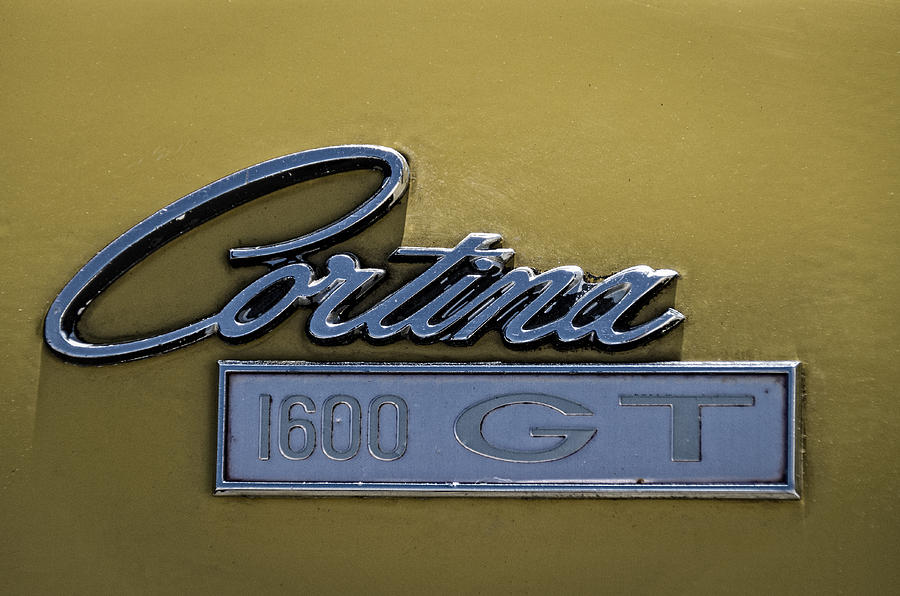 Old Ford Cortina Symbol Photograph by Paulo Goncalves