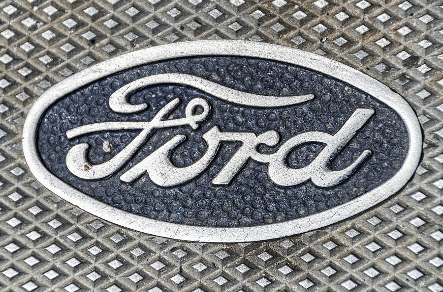 Old Ford Symbol Photograph by Paulo Goncalves