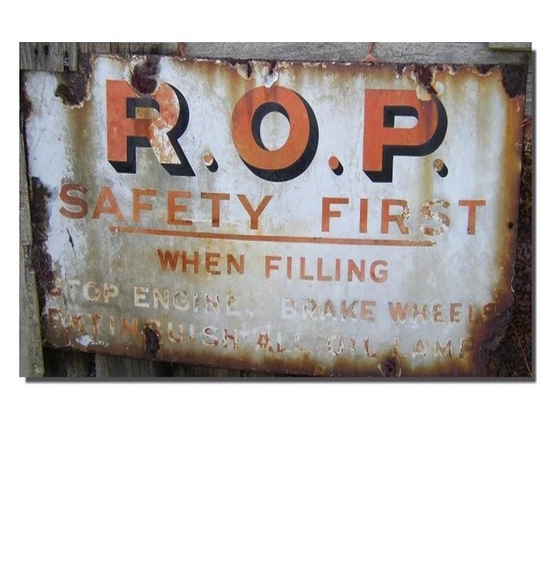 Sign Photograph - Old Garage sign by Geoff Cooper