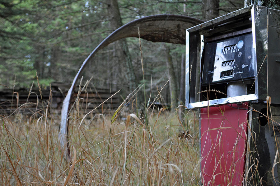 Old Gas Pump in the Montana Woods Photograph by Bruce Gourley