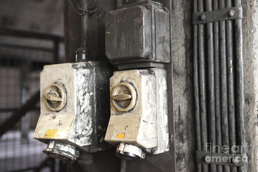 Old industrial light switches Photograph by Patricia Hofmeester