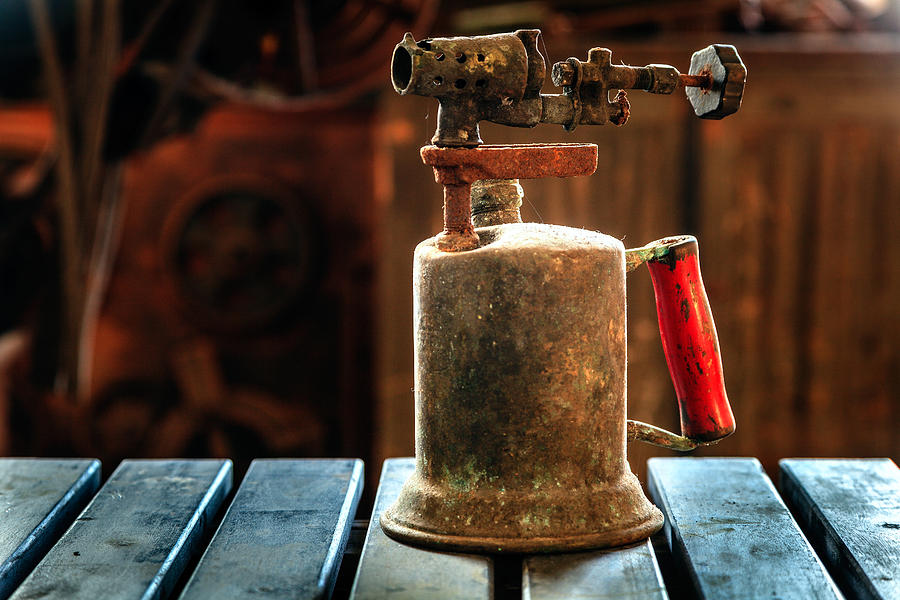 Old kerosene torch Photograph by Alexey Stiop