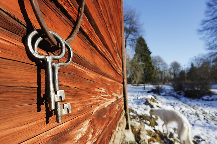 Old Keys Against Barn Photograph by Christian Lagereek