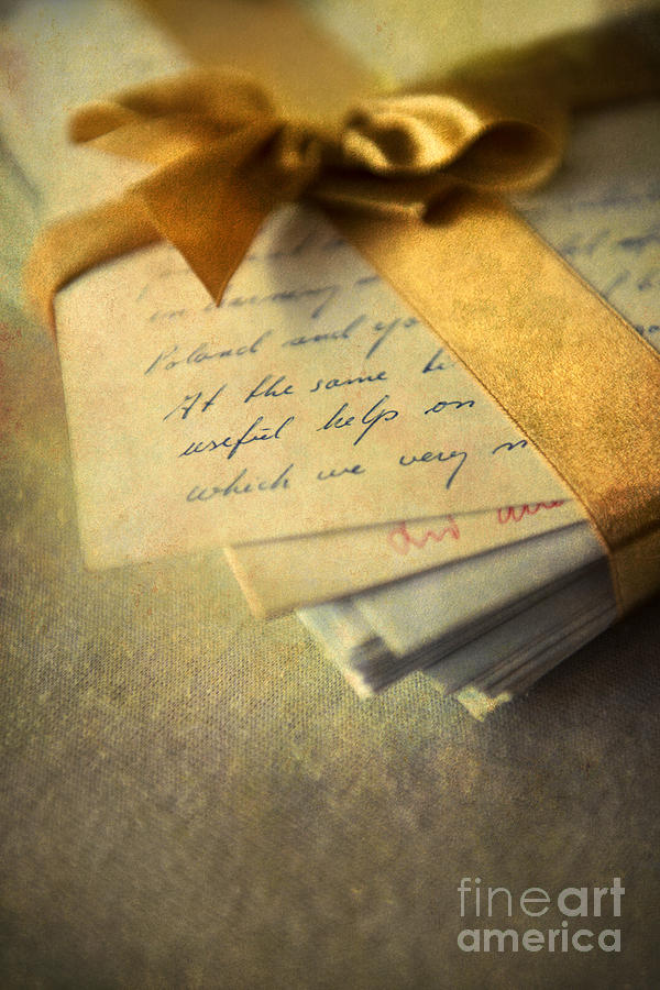 Old letters and a golden ribbon Photograph by Jaroslaw Blaminsky