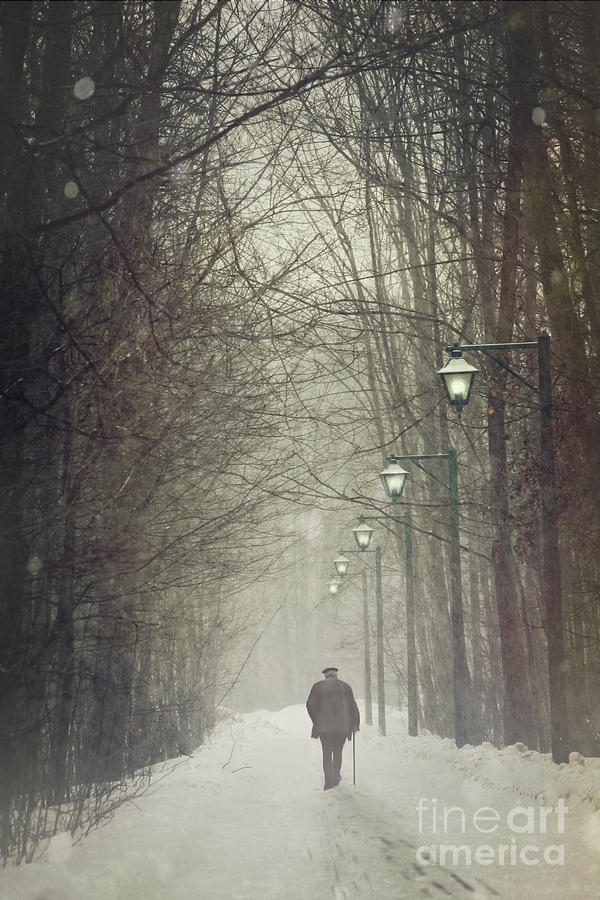 Winter Photograph - Old man walking on snowy winter path by Sandra Cunningham