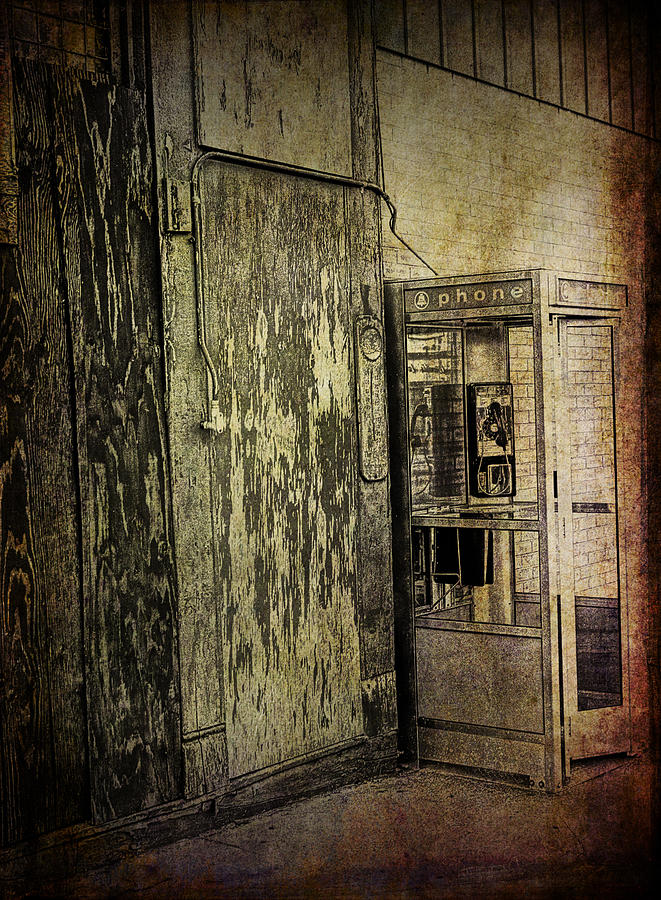 Old Phone Booth along a City Street Photograph by Randall Nyhof