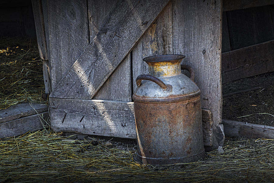 Old Prairie Homestead Vintage Creamery Can by the barn door Photograph by Randall Nyhof