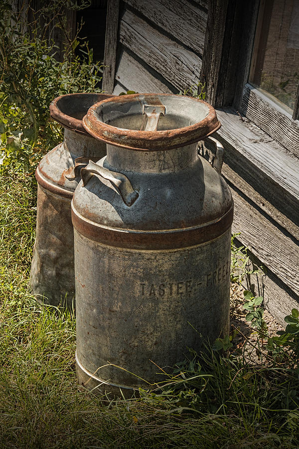Old Prairie Homestead Vintage Creamery Cans near the Badlands Photograph by Randall Nyhof