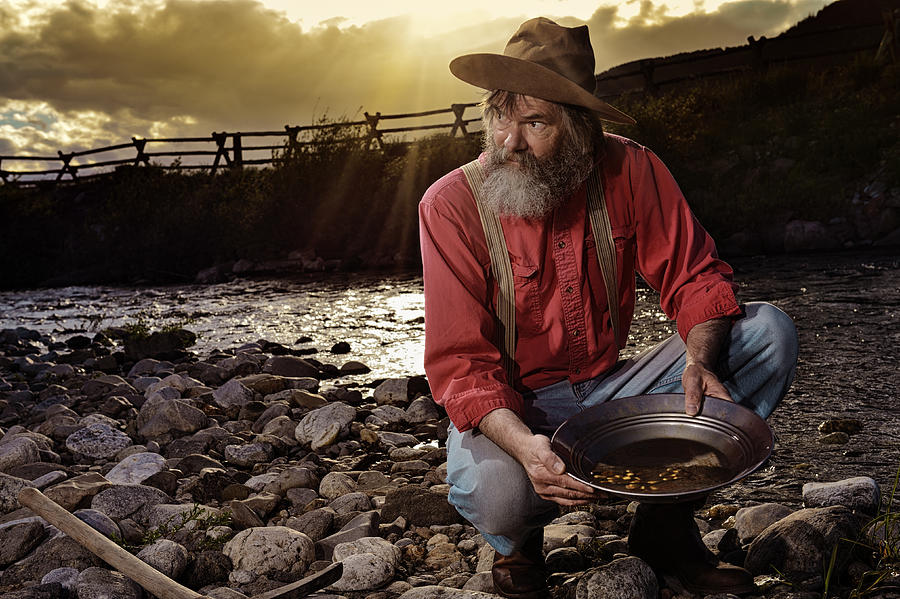 Old Prospector Panning For Gold In A Western Sunset Photograph by LifeJourneys