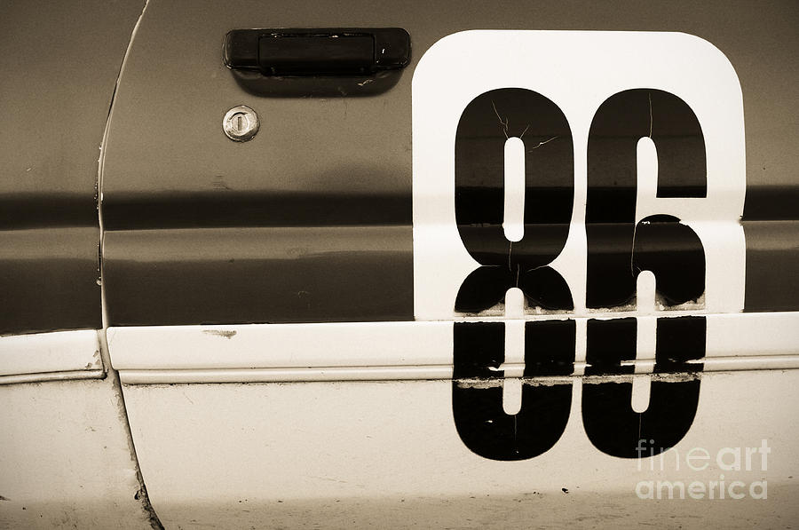 Vintage Photograph - Old Racecar Number by Grigorios Moraitis