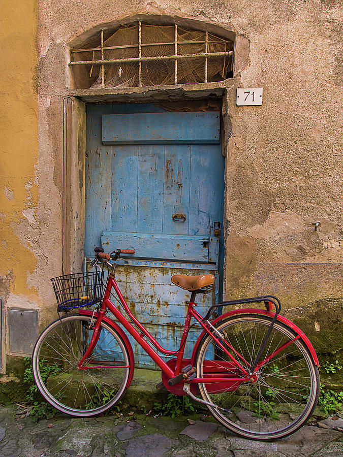 Old Red Bicycle Leaning Against A Photograph by Carl Larson Photography
