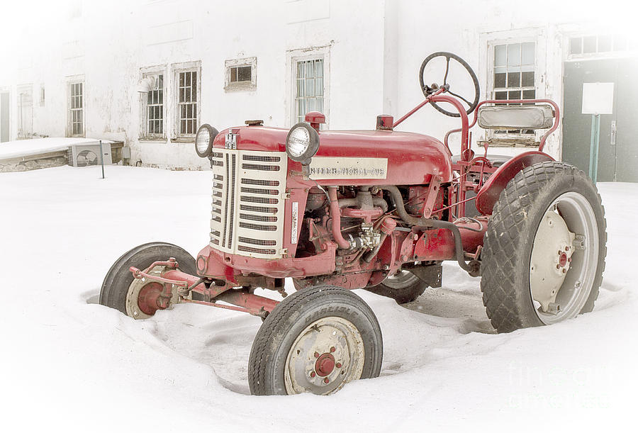 Old Red Tractor in the snow Photograph by Edward Fielding